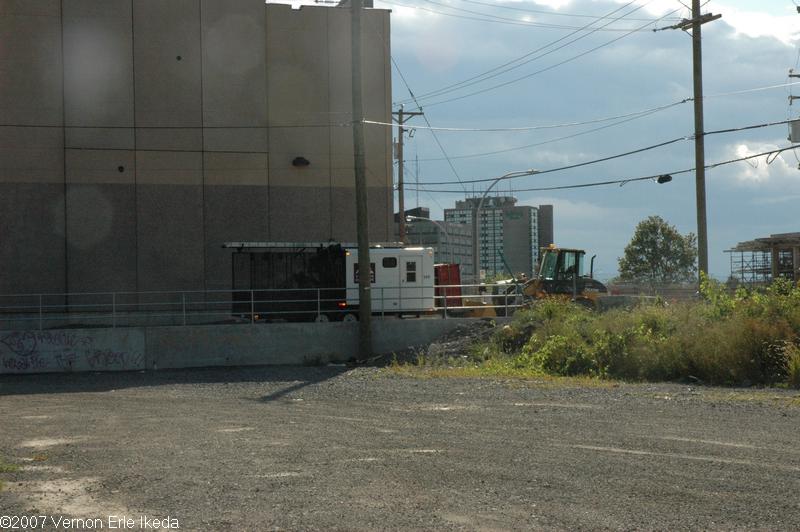 Looking west to the back of the Home Depot under construction.  The building in the background is the Pointe Claire Holiday Inn.